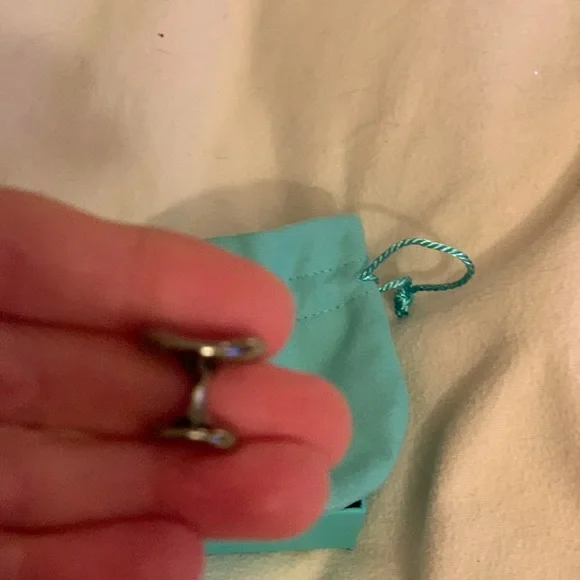 Authentic brand new Tiffany cufflinks with pouch.Rare and limited edition. Must!